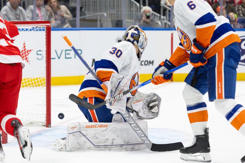 Oct 30, 2023; Elmont, New York, USA; New York Islanders goaltender Ilya Sorokin (30) watches the puck enter the goal against the Detroit Red Wings during the third period at UBS Arena. Mandatory Credit: Thomas Salus-USA TODAY Sports