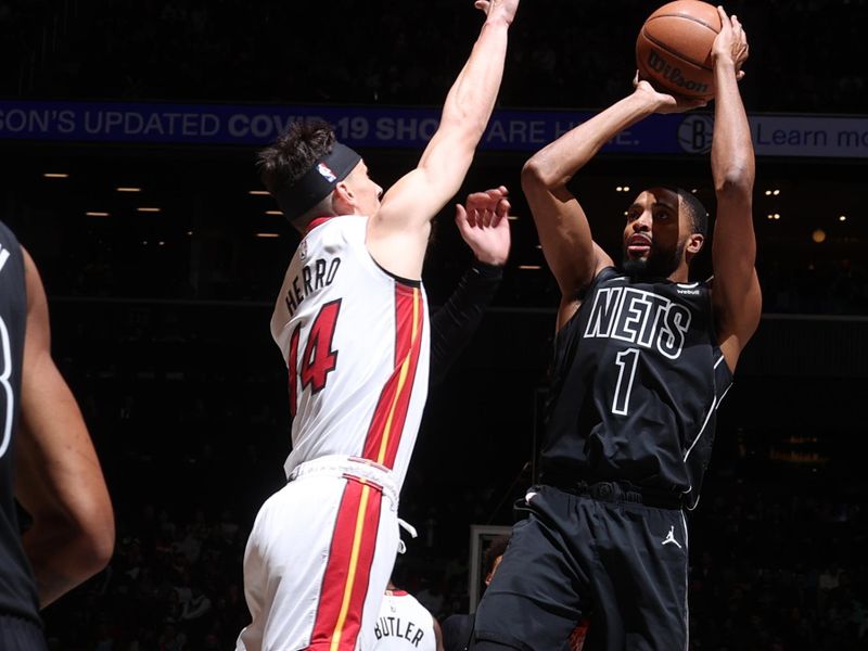 BROOKLYN, NY - JANUARY 15: Mikal Bridges #1 of the Brooklyn Nets shoots the ball during the game against the Miami Heat on January 15, 2024 at Barclays Center in Brooklyn, New York. NOTE TO USER: User expressly acknowledges and agrees that, by downloading and or using this Photograph, user is consenting to the terms and conditions of the Getty Images License Agreement. Mandatory Copyright Notice: Copyright 2024 NBAE (Photo by Nathaniel S. Butler/NBAE via Getty Images)