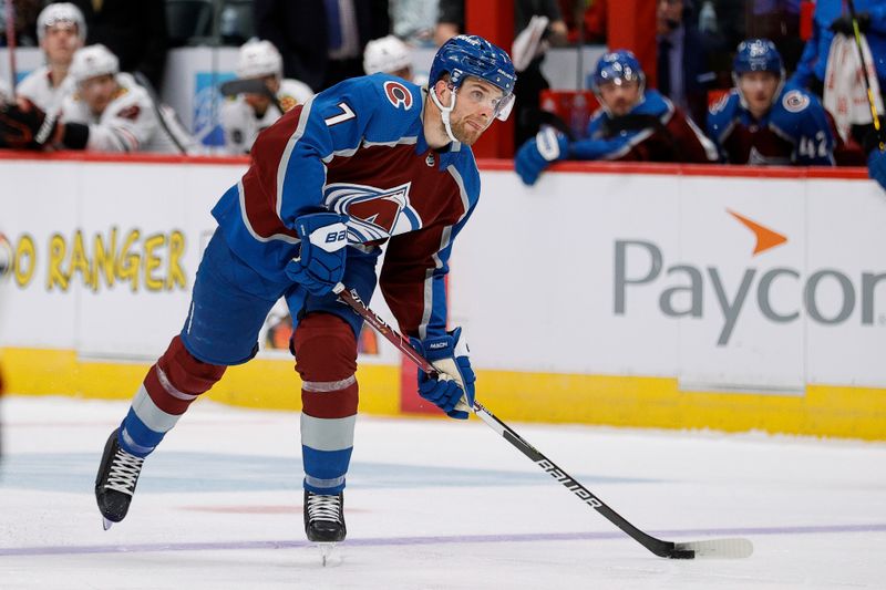 Oct 19, 2023; Denver, Colorado, USA; Colorado Avalanche defenseman Devon Toews (7) controls the puck in the second period against the Chicago Blackhawks at Ball Arena. Mandatory Credit: Isaiah J. Downing-USA TODAY Sports