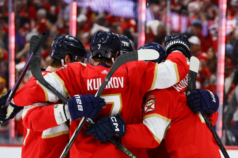 May 8, 2024; Sunrise, Florida, USA; Florida Panthers center Eetu Luostarinen (27) celebrates with teammates after scoring against the Boston Bruins during the third period in game two of the second round of the 2024 Stanley Cup Playoffs at Amerant Bank Arena. Mandatory Credit: Sam Navarro-USA TODAY Sports