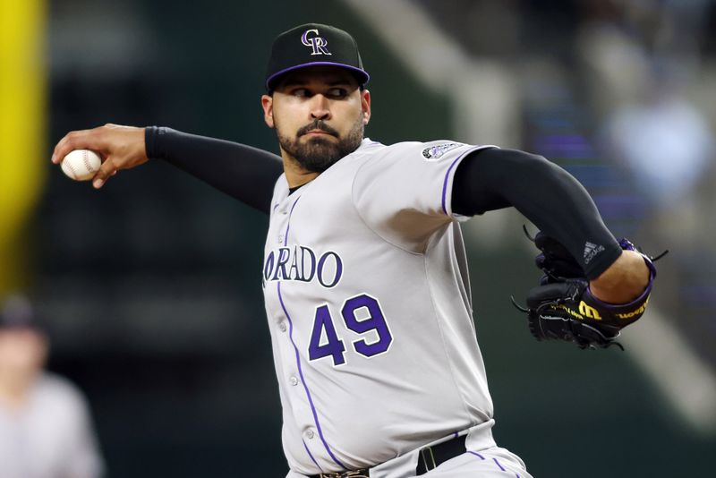 May 14, 2025; Arlington, Texas, USA; Colorado Rockies pitcher Antonio Senzatela (49) throws a pitch during the third inning against the Texas Rangers at Globe Life Field. Mandatory Credit: Tim Heitman-Imagn Images