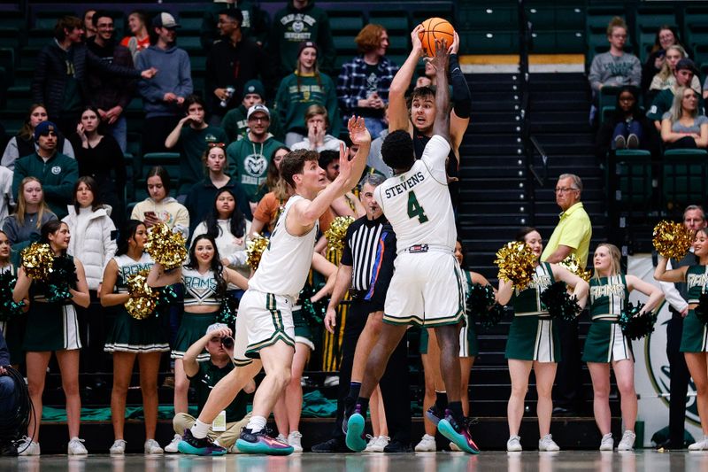 Feb 15, 2023; Fort Collins, Colorado, USA; Boise State Broncos forward Tyson Degenhart (2) looks to pass the ball as Colorado State Rams forward Patrick Cartier (12) and guard Isaiah Stevens (4) defend in the second half at Moby Arena. Mandatory Credit: Isaiah J. Downing-USA TODAY Sports