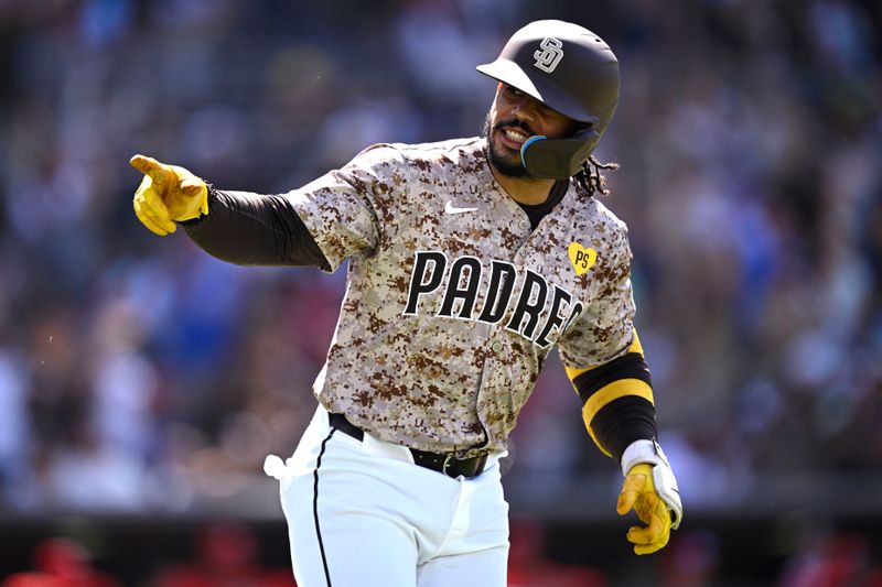 Apr 28, 2024; San Diego, California, USA; San Diego Padres catcher Luis Campusano (12) gestures toward the Padres dugout after hitting a three-run home run against the Philadelphia Phillies during the seventh inning at Petco Park. Mandatory Credit: Orlando Ramirez-USA TODAY Sports