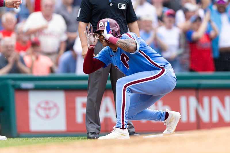 May 23, 2024; Philadelphia, Pennsylvania, USA; Philadelphia Phillies outfielder Cristian Pache (19) reacts after hitting a two RBI triple during the fourth inning against the Texas Rangers at Citizens Bank Park. Mandatory Credit: Bill Streicher-USA TODAY Sports