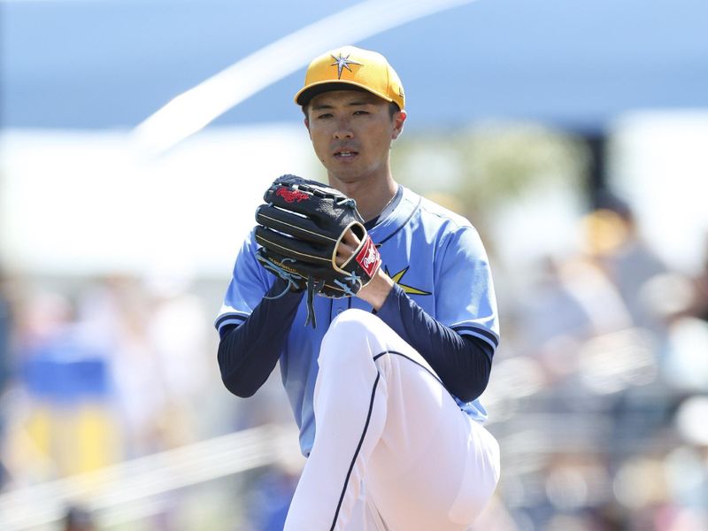 Mar 15, 2024; Port Charlotte, Florida, USA;  Tampa Bay Rays pitcher Naoyuki Uwasawa (36) throws a pitch against the Baltimore Orioles in the first inning at Charlotte Sports Park. Mandatory Credit: Nathan Ray Seebeck-USA TODAY Sports