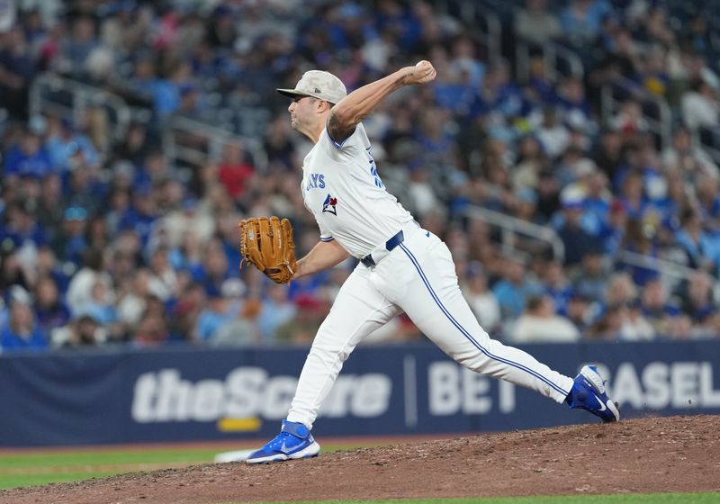 May 18, 2025; Toronto, Ontario, CAN; Toronto Blue Jays relief pitcher Mason Fluharty (68) throws a pitch against the Detroit Tigers during the sixth inning at Rogers Centre. Mandatory Credit: Nick Turchiaro-Imagn Images