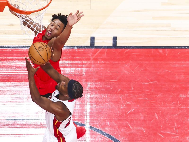 TORONTO, CANADA - JANUARY 17: Jimmy Butler #22 of the Miami Heat drives to the basket during the game against the Toronto Raptors on January 17, 2024 at the Scotiabank Arena in Toronto, Ontario, Canada.  NOTE TO USER: User expressly acknowledges and agrees that, by downloading and or using this Photograph, user is consenting to the terms and conditions of the Getty Images License Agreement.  Mandatory Copyright Notice: Copyright 2024 NBAE (Photo by Vaughn Ridley/NBAE via Getty Images)