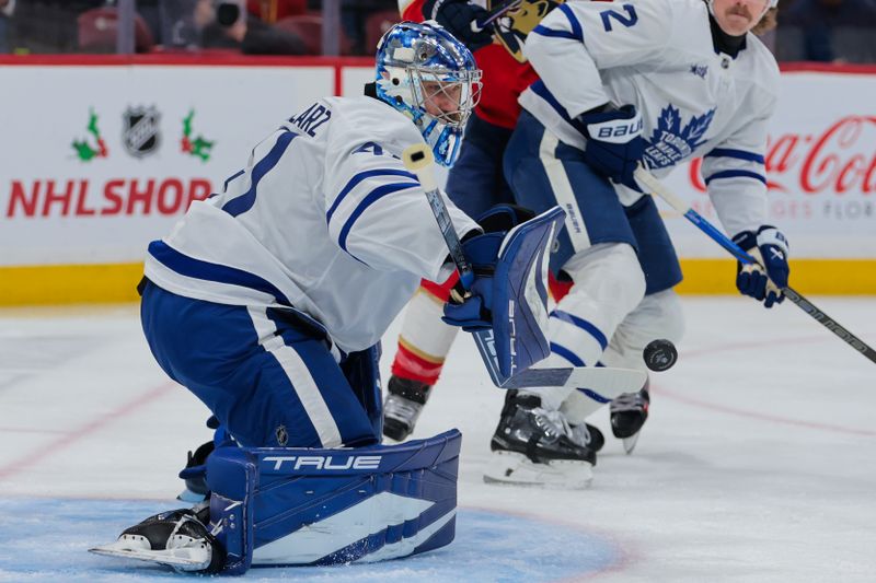 Nov 27, 2024; Sunrise, Florida, USA; Toronto Maple Leafs goaltender Anthony Stolarz (41) makes a save against the Florida Panthers during the first period at Amerant Bank Arena. Mandatory Credit: Sam Navarro-Imagn Images