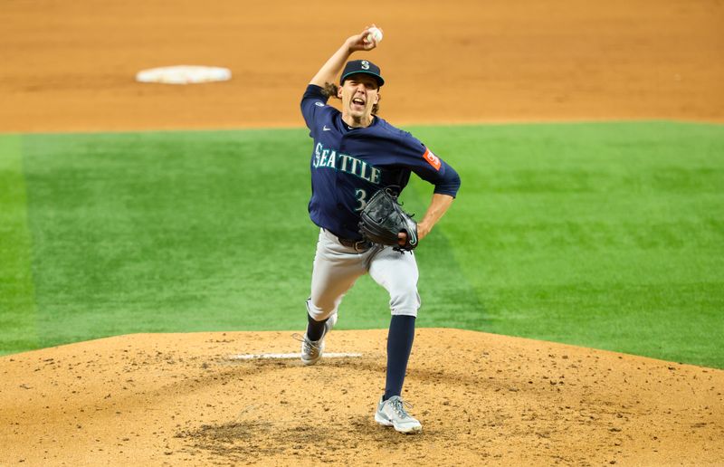 Jun 27, 2025; Arlington, Texas, USA;  Seattle Mariners starting pitcher Logan Gilbert (36) throws during the fifth inning against the Texas Rangers at Globe Life Field. Mandatory Credit: Kevin Jairaj-Imagn Images