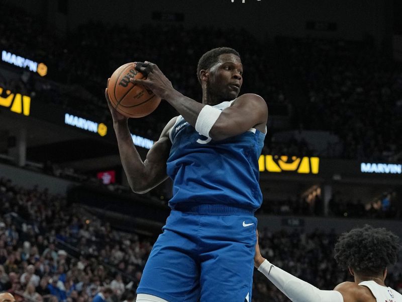 MINNEAPOLIS, MN -  MARCH 22: Anthony Edwards #5 of the Minnesota Timberwolves rebounds the ball during the game against the Cleveland Cavaliers on March 22, 2024 at Target Center in Minneapolis, Minnesota. NOTE TO USER: User expressly acknowledges and agrees that, by downloading and or using this Photograph, user is consenting to the terms and conditions of the Getty Images License Agreement. Mandatory Copyright Notice: Copyright 2024 NBAE (Photo by Jordan Johnson/NBAE via Getty Images)