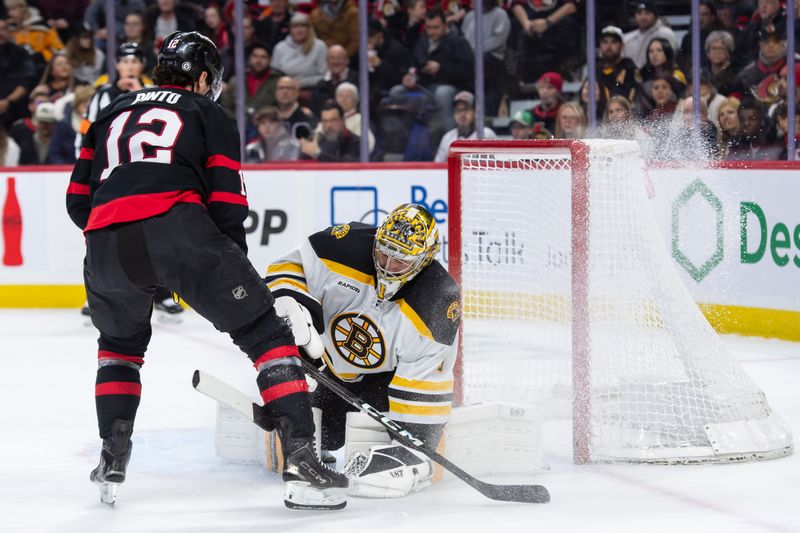 Jan 18, 2025; Ottawa, Ontario, CAN; Boston Bruins goalie Jeremy Swayman (1) makes a save on a shot from Ottawa Senators center Shane Pinto (12) in the first period at the Canadian Tire Centre. Mandatory Credit: Marc DesRosiers-Imagn Images