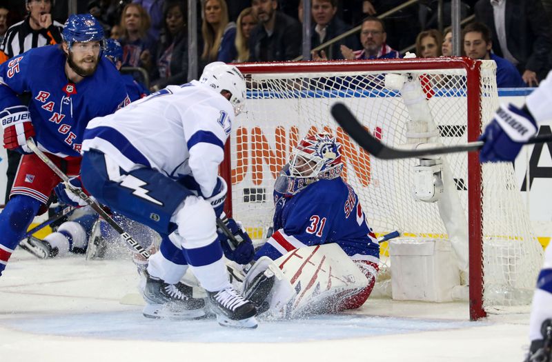 Apr 5, 2023; New York, New York, USA; Tampa Bay Lightning left wing Alex Killorn (17) runs into New York Rangers goalie Igor Shesterkin (31) during the second period at Madison Square Garden. Mandatory Credit: Danny Wild-USA TODAY Sports