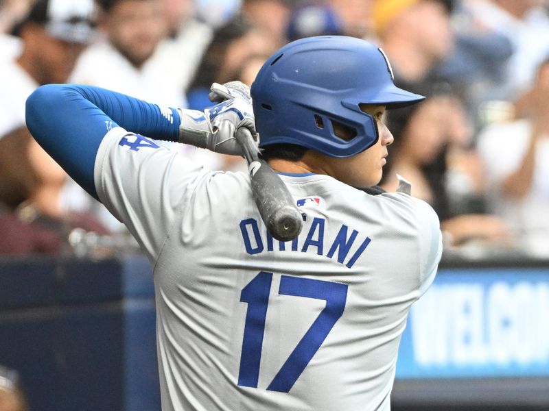 Aug 12, 2024; Milwaukee, Wisconsin, USA; Los Angeles Dodgers two-way player Shohei Ohtani (17) waits to bat in the first innning against the Milwaukee Brewers at American Family Field. Mandatory Credit: Michael McLoone-USA TODAY Sports