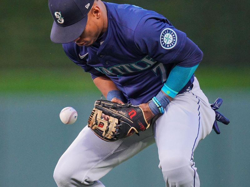 May 7, 2024; Minneapolis, Minnesota, USA; Seattle Mariners second baseman Jorge Polanco (7) drops a ground ball against the Minnesota Twins in the sixth inning at Target Field. Mandatory Credit: Brad Rempel-USA TODAY Sports