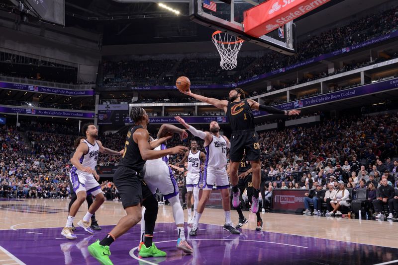 SACRAMENTO, CA - MARCH 19:  Max Strus #1 of the Cleveland Cavaliers goes up for the rebound during the game against the Sacramento Kings  on March 19, 2025 at Golden 1 Center in Sacramento, California. NOTE TO USER: User expressly acknowledges and agrees that, by downloading and or using this Photograph, user is consenting to the terms and conditions of the Getty Images License Agreement. Mandatory Copyright Notice: Copyright 2025 NBAE (Photo by Rocky Widner/NBAE via Getty Images)