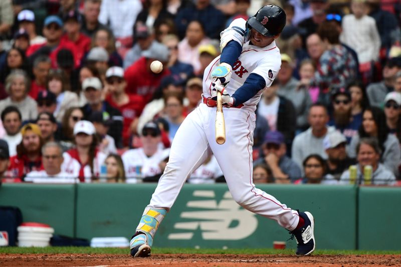 Sep 29, 2024; Boston, Massachusetts, USA;  Boston Red Sox first baseman Triston Casas (36) hits a single during the fifth inning against the Tampa Bay Rays at Fenway Park. Mandatory Credit: Bob DeChiara-Imagn Images