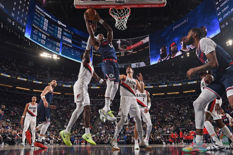 INGLEWOOD, CA - OCTOBER 30: Terance Mann #14 of the LA Clippers goes up for the rebound during the game against the Portland Trail Blazers on October 30, 2024 at Intuit Dome in Los Angeles, California. NOTE TO USER: User expressly acknowledges and agrees that, by downloading and/or using this Photograph, user is consenting to the terms and conditions of the Getty Images License Agreement. Mandatory Copyright Notice: Copyright 2024 NBAE (Photo by Juan Ocampo/NBAE via Getty Images)