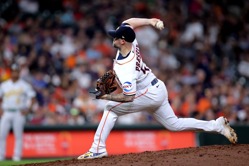 Sep 13, 2023; Houston, Texas, USA; Houston Astros relief pitcher Ryan Pressly (55) delivers a pitch against the Oakland Athletics during the ninth inning at Minute Maid Park. Mandatory Credit: Erik Williams-USA TODAY Sports