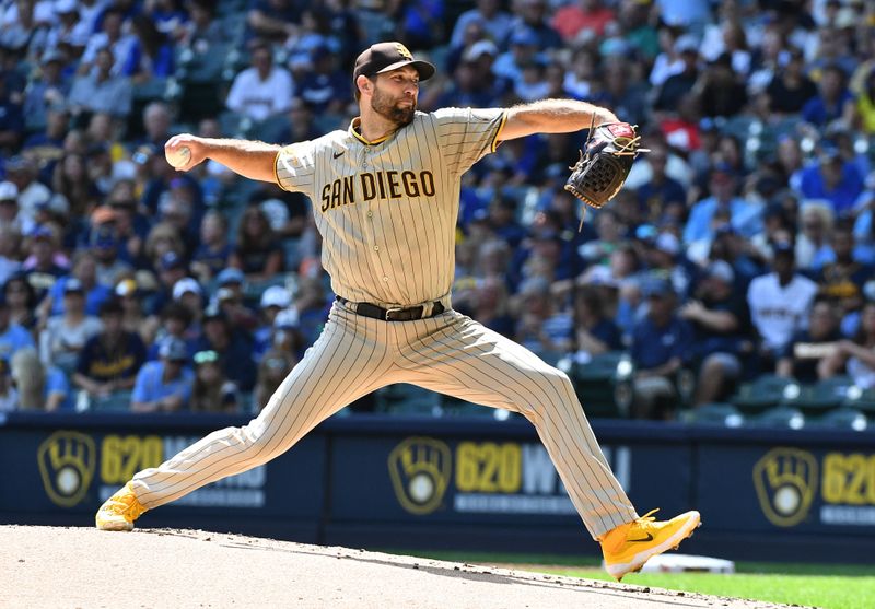 Aug 27, 2023; Milwaukee, Wisconsin, USA; San Diego Padres starting pitcher Michael Wacha (52) delivers a pitch against the Milwaukee Brewers in the first inning at American Family Field. Mandatory Credit: Michael McLoone-USA TODAY Sports