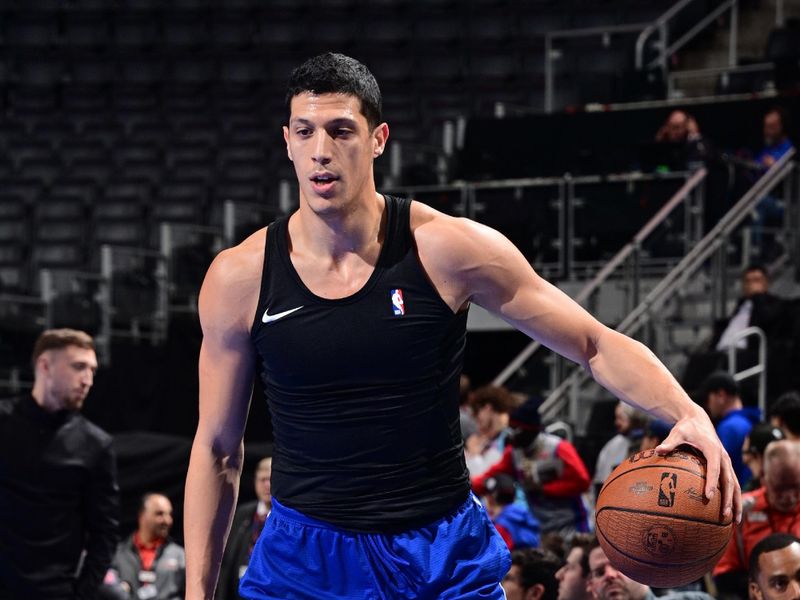DETROIT, MI - NOVEMBER 12: Simone Fontecchio #19 of the Detroit Pistons warms up before the game against the Miami Heat during the Emirates NBA Cup game on November 12, 2024 at Little Caesars Arena in Detroit, Michigan. NOTE TO USER: User expressly acknowledges and agrees that, by downloading and/or using this photograph, User is consenting to the terms and conditions of the Getty Images License Agreement. Mandatory Copyright Notice: Copyright 2024 NBAE (Photo by Chris Schwegler/NBAE via Getty Images)