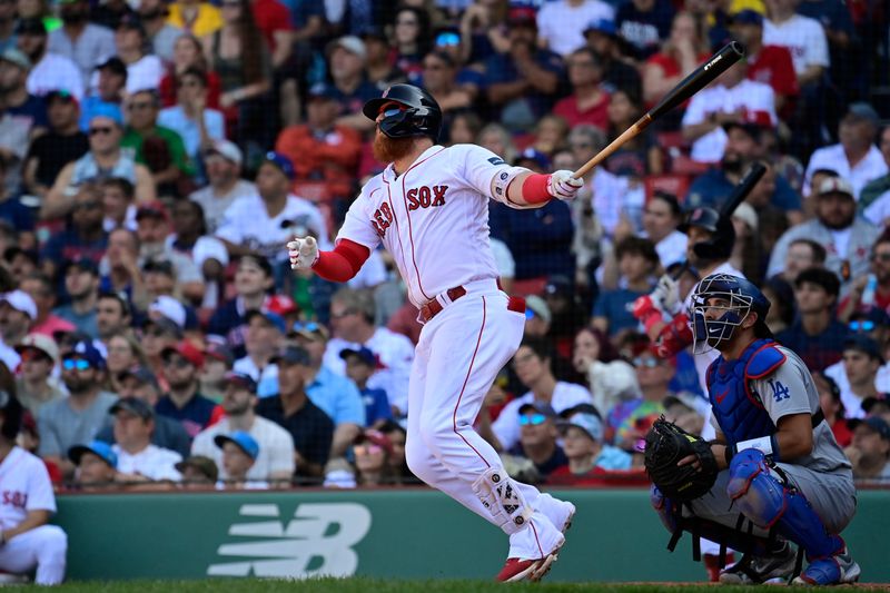 Aug 27, 2023; Boston, Massachusetts, USA; Boston Red Sox designated hitter Justin Turner (2) hits a home run against the Los Angeles Dodgers during the eighth inning at Fenway Park. Mandatory Credit: Eric Canha-USA TODAY Sports