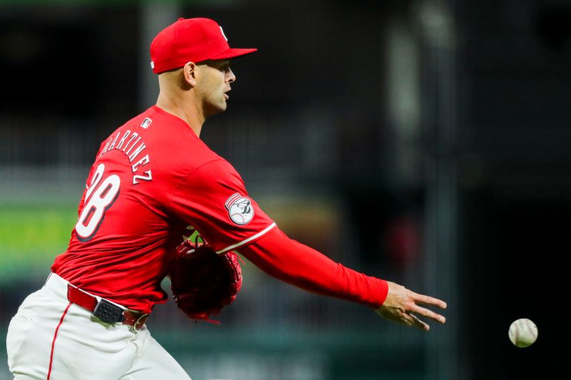 Apr 20, 2024; Cincinnati, Ohio, USA; Cincinnati Reds relief pitcher Nick Martinez (28) throws to first to get Los Angeles Angels third baseman Luis Rengifo (not pictured) out in the eighth inning at Great American Ball Park. Mandatory Credit: Katie Stratman-USA TODAY Sports