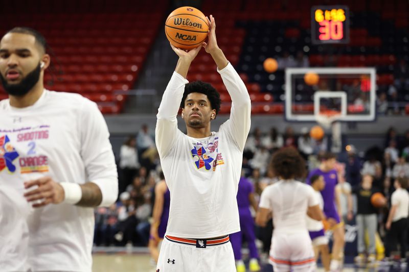 Jan 13, 2024; Auburn, Alabama, USA;  Auburn Tigers center Dylan Cardwell practices free throws before the game against the LSU Tigers at Neville Arena. Mandatory Credit: John Reed-USA TODAY Sports