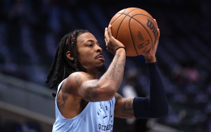 DALLAS, TX - OCTOBER 7: Ja Morant #12 of the Memphis Grizzlies warms up prior to a pre-season game against the Dallas Mavericks at American Airlines Center on October 7, 2024 in Dallas, Texas. NOTE TO USER: User expressly acknowledges and agrees that, by downloading and or using this photograph, User is consenting to the terms and conditions of the Getty Images License Agreement. (Photo by Ron Jenkins/Getty Images)