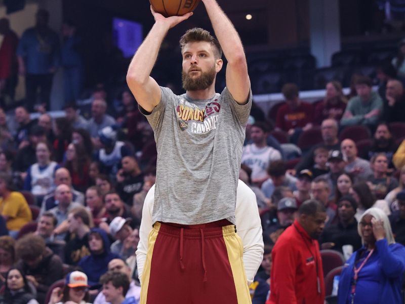 CLEVELAND, OH - March 8: Dean Wade #32 of the Cleveland Cavaliers warms up before the game against the Minnesota Timberwolves on March 8, 2024 at Rocket Mortgage FieldHouse in Cleveland, Ohio. NOTE TO USER: User expressly acknowledges and agrees that, by downloading and/or using this Photograph, user is consenting to the terms and conditions of the Getty Images License Agreement. Mandatory Copyright Notice: Copyright 2024 NBAE (Photo by Lauren Leigh Bacho/NBAE via Getty Images)