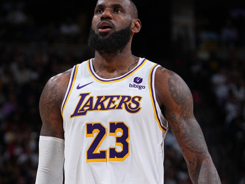 DENVER, CO - APRIL 20: LeBron James #23 of the Los Angeles Lakers shoots a free throw during the game against the Denver Nuggets during Round 1 Game 1 of the 2024 NBA Playoffs on April 20, 2024 at the Ball Arena in Denver, Colorado. NOTE TO USER: User expressly acknowledges and agrees that, by downloading and/or using this Photograph, user is consenting to the terms and conditions of the Getty Images License Agreement. Mandatory Copyright Notice: Copyright 2024 NBAE (Photo by Garrett Ellwood/NBAE via Getty Images)