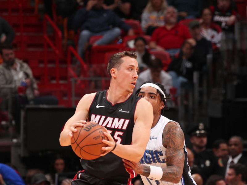 MIAMI, FL - FEBRUARY 6: Duncan Robinson #55 of the Miami Heat handles the ball during the game against the Orlando Magic on February 6, 2024 at Kaseya Center in Miami, Florida. NOTE TO USER: User expressly acknowledges and agrees that, by downloading and or using this Photograph, user is consenting to the terms and conditions of the Getty Images License Agreement. Mandatory Copyright Notice: Copyright 2024 NBAE (Photo by Issac Baldizon/NBAE via Getty Images)