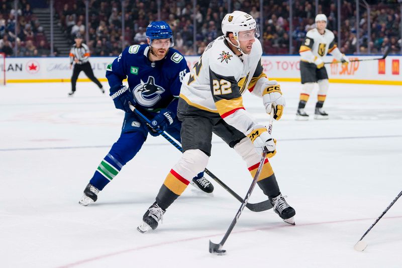 Nov 30, 2023; Vancouver, British Columbia, CAN; Vancouver Canucks defenseman Ian Cole (82) watches as Vegas Golden Knights forward Michael Amadio (22) shoots in the third period at Rogers Arena. Vegas won 4-1. Mandatory Credit: Bob Frid-USA TODAY Sports