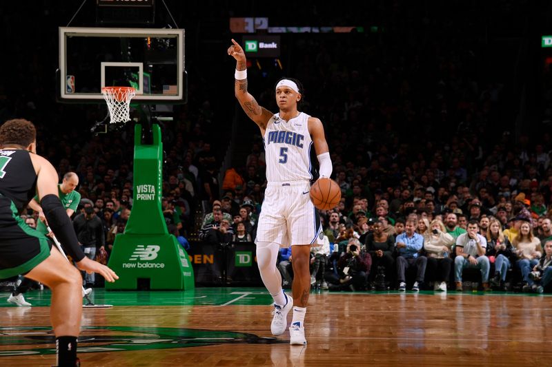 BOSTON, MA - DECEMBER 16: Paolo Banchero #5 of the Orlando Magic dribbles the ball during the game against the Boston Celtics on December 16, 2022 at the TD Garden in Boston, Massachusetts.  NOTE TO USER: User expressly acknowledges and agrees that, by downloading and or using this photograph, User is consenting to the terms and conditions of the Getty Images License Agreement. Mandatory Copyright Notice: Copyright 2022 NBAE  (Photo by Brian Babineau/NBAE via Getty Images)