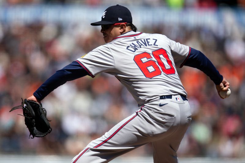 Aug 15, 2024; San Francisco, California, USA; Atlanta Braves pitcher Jesse Chavez (60) delivers against the San Francisco Giants during the sixth inning at Oracle Park. Mandatory Credit: D. Ross Cameron-USA TODAY Sports