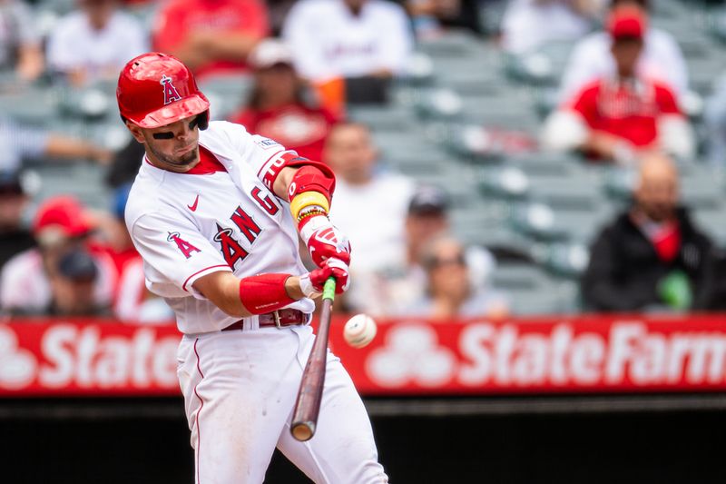 Oct 1, 2023; Anaheim, California, USA; Los Angeles Angels shortstop Zach Neto (9) flies out against the Oakland Athletics during the third inning at Angel Stadium. Mandatory Credit: Jonathan Hui-USA TODAY Sports