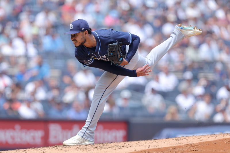 Jul 20, 2024; Bronx, New York, USA; Tampa Bay Rays starting pitcher Taj Bradley (45) follows through on a pitch against the New York Yankees during the third inning at Yankee Stadium. Mandatory Credit: Brad Penner-USA TODAY Sports