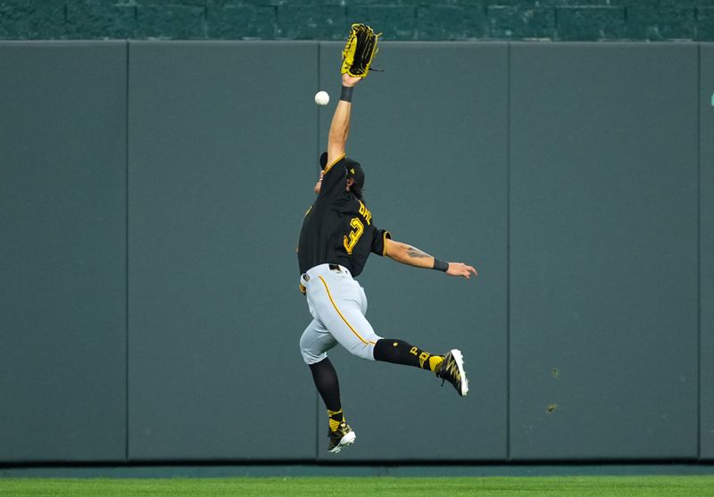 Aug 30, 2023; Kansas City, Missouri, USA; Pittsburgh Pirates second baseman Ji Hwan Bae (3) leaps for a triple hit by Kansas City Royals third baseman Maikel Garcia (not pictured) during the ninth inning at Kauffman Stadium. Mandatory Credit: Jay Biggerstaff-USA TODAY Sports