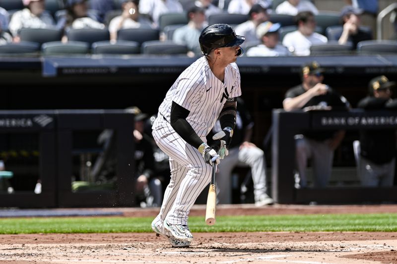 May 19, 2024; Bronx, New York, USA; New York Yankees second baseman Gleyber Torres (25) hits a double against the Chicago White Sox during the second inning at Yankee Stadium. Mandatory Credit: John Jones-USA TODAY Sports