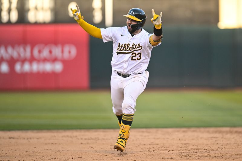 Sep 2, 2024; Oakland, California, USA; Oakland Athletics catcher Shea Langeliers (23) runs the bases after hitting a walk-off home run in the ninth inning against the Seattle Mariners at Oakland-Alameda County Coliseum. Mandatory Credit: Eakin Howard-USA TODAY Sports