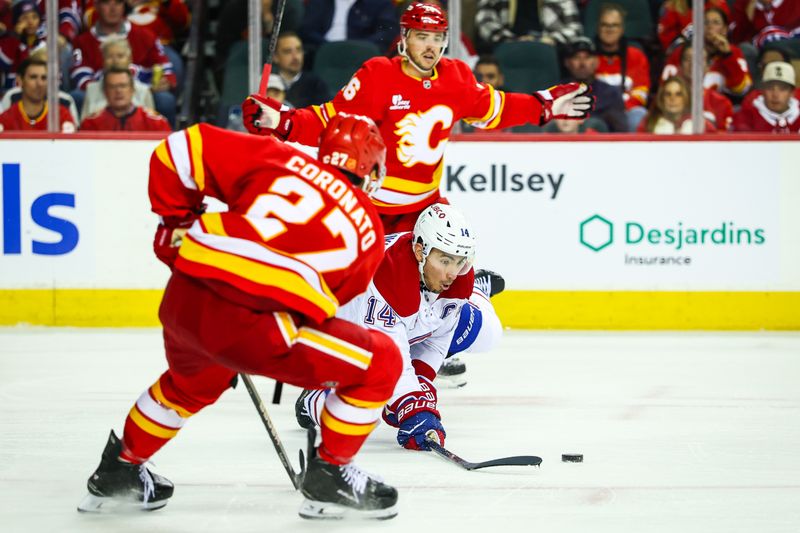 Oct 22, 2025; Calgary, Alberta, CAN; Montreal Canadiens center Nick Suzuki (14) battles for the puck against the Calgary Flames during the third period at Scotiabank Saddledome. Mandatory Credit: Sergei Belski-Imagn Images