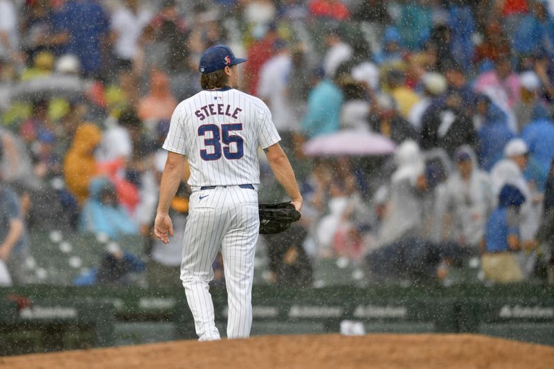 Aug 17, 2024; Chicago, Illinois, USA; Chicago Cubs starting pitcher Justin Steele (35) walks to the dugout during the second inning against the Toronto Blue Jays after a rain delay is called at Wrigley Field. Mandatory Credit: Patrick Gorski-USA TODAY Sports