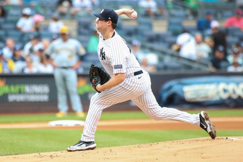 Sep 10, 2023; Bronx, New York, USA;  New York Yankees starting pitcher Gerrit Cole (45) pitches in the first inning against the Milwaukee Brewers at Yankee Stadium. Mandatory Credit: Wendell Cruz-USA TODAY Sports