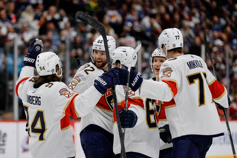 Jan 6, 2024; Denver, Colorado, USA; Florida Panthers center Kevin Stenlund (82) celebrates his goal with left wing Ryan Lomberg (94) and right wing William Lockwood (67) and defenseman Niko Mikkola (77) and defenseman Gustav Forsling (42) in the third period against the Colorado Avalanche at Ball Arena. Mandatory Credit: Isaiah J. Downing-USA TODAY Sports