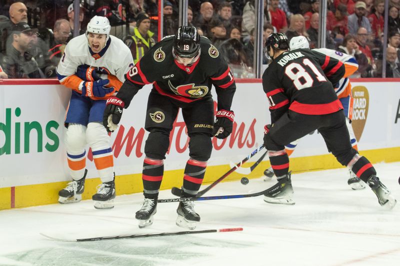 Nov 24, 2023; Ottawa, Ontario, CAN; New York Islanders defenseman Adam Pelech (3) is injured on a play in the first period against the  Ottawa Senators at the Canadian Tire Centre. Mandatory Credit: Marc DesRosiers-USA TODAY Sports