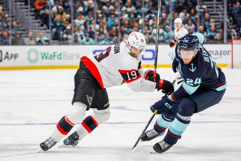 Jan 4, 2024; Seattle, Washington, USA; Ottawa Senators right wing Drake Batherson (19) skates against Seattle Kraken defenseman Jamie Oleksiak (24) during the third period at Climate Pledge Arena. Mandatory Credit: Joe Nicholson-USA TODAY Sports