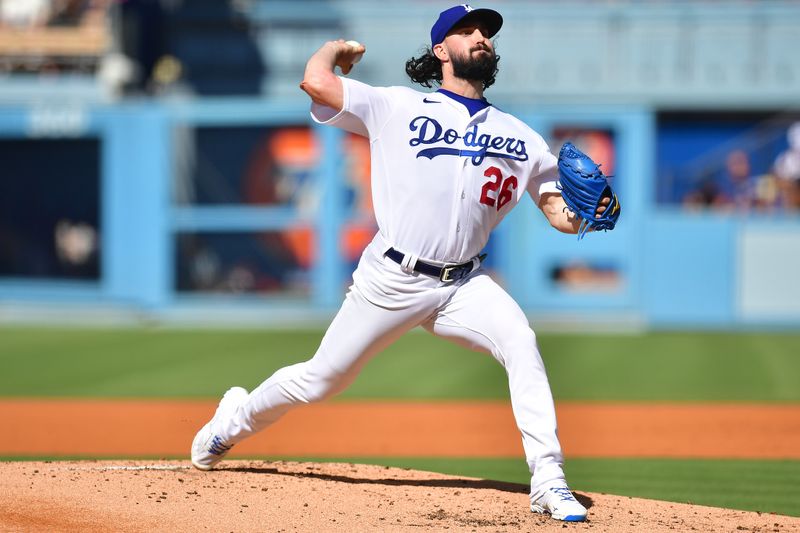 Jun 25, 2023; Los Angeles, California, USA; Los Angeles Dodgers starting pitcher Tony Gonsolin (26) throws against the Houston Astros during the second inning at Dodger Stadium. Mandatory Credit: Gary A. Vasquez-USA TODAY Sports