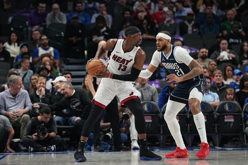 DALLAS, TX - MARCH 7: Bam Adebayo #13 of the Miami Heat handles the ball during the game /adm on March 7, 2024 at the American Airlines Center in Dallas, Texas. NOTE TO USER: User expressly acknowledges and agrees that, by downloading and or using this photograph, User is consenting to the terms and conditions of the Getty Images License Agreement. Mandatory Copyright Notice: Copyright 2024 NBAE (Photo by Glenn James/NBAE via Getty Images)