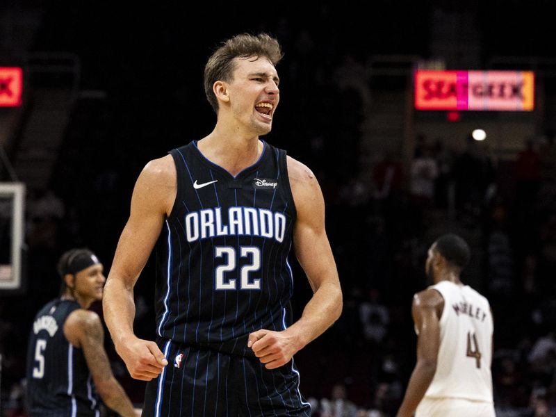 CLEVELAND, OHIO - FEBRUARY 22: Franz Wagner #22 of the Orlando Magic celebrates during the game against the against the Cleveland Cavaliers at Rocket Mortgage Fieldhouse on February 22, 2024 in Cleveland, Ohio. The Magic beat the Cavaliers 116-109.<p><br/></p>NOTE TO USER: User expressly acknowledges and agrees that, by downloading and or using this photograph, User is consenting to the terms and conditions of the Getty Images License Agreement. (Photo by Lauren Leigh Bacho/Getty Images)