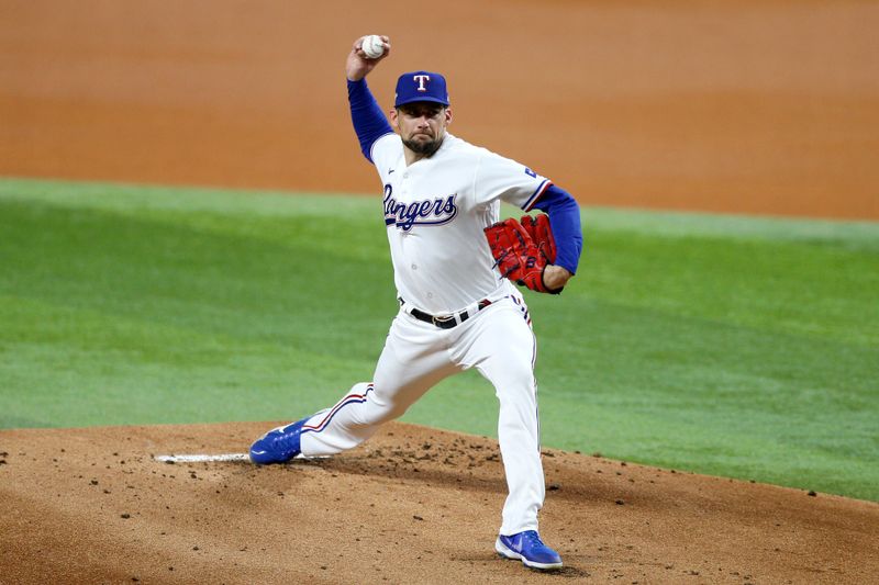 Oct 10, 2023; Arlington, Texas, USA; Texas Rangers starting pitcher Nathan Eovaldi (17) pitches in the first inning against the Baltimore Orioles during game three of the ALDS for the 2023 MLB playoffs at Globe Life Field. Mandatory Credit: Andrew Dieb-USA TODAY Sports