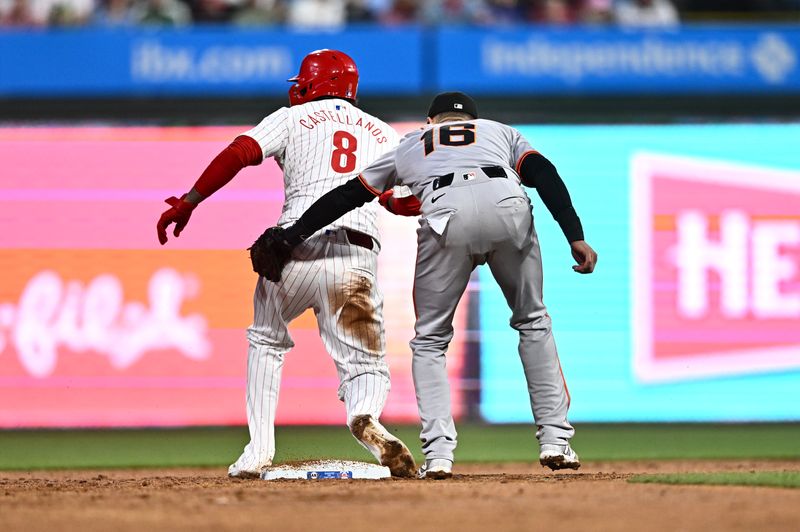 May 5, 2024; Philadelphia, Pennsylvania, USA; Philadelphia Phillies outfielder Nick Castellanos (8) steals second against San Francisco Giants shortstop Nick Ahmed (16) in the third inning at Citizens Bank Park. Mandatory Credit: Kyle Ross-USA TODAY Sports